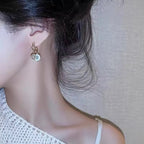 Round Shell Flower Pendant Earrings